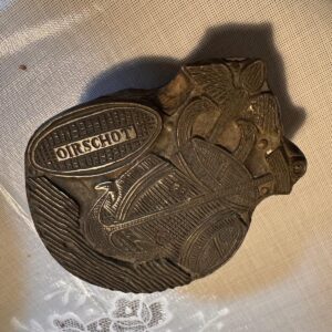 Wie weet waar deze stempel vandaan komt?